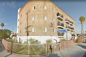North Hollywood apartment for rent - a building with a street sign in front of it