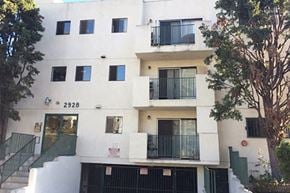 Los Angeles apartment for rent - an apartment building with balconies and a staircase
