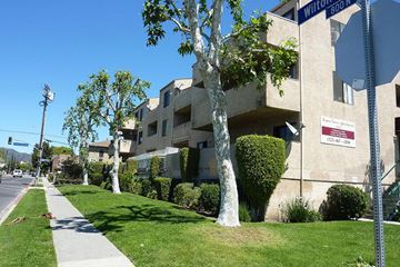 Los Angeles apartment for rent - an apartment building with trees in front of it