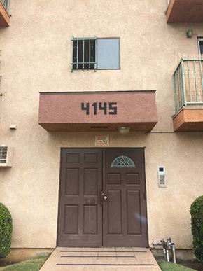 Los Angeles apartment for rent - a building with a brown door and a window