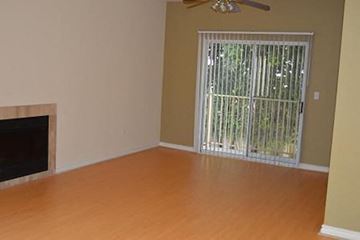 Los Angeles apartment for rent - a living room with a wood floor and a fireplace