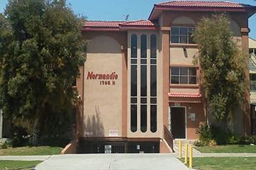 Los Angeles apartment for rent - a large building with a sign on the front of it