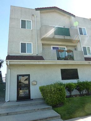 Los Angeles apartment for rent - a white house with a door and a balcony