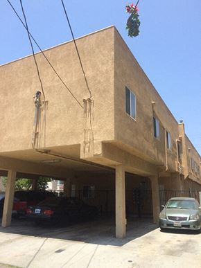 Panorama City apartment for rent - a building with a car parked in front of it