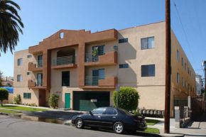 Los Angeles apartment for rent - a car parked in front of an apartment building