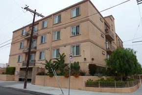 Los Angeles apartment for rent - a building with a street sign in front of it