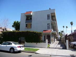 Los Angeles apartment for rent - a white car parked in front of an apartment building