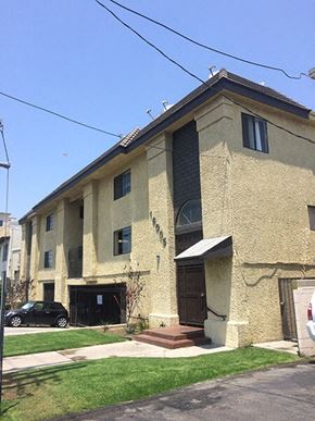 Van Nuys apartment for rent - a building with a car parked outside of it
