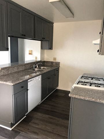 Van Nuys apartment for rent - a kitchen with a stove and a sink