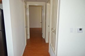 Los Angeles apartment for rent - a hallway with a wood floor and white doors