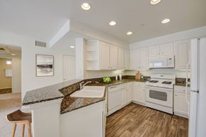 Newbury Park apartment for rent - A large kitchen with breakfast bar at Monarch at Dos Vientos Newbury Park, CA 91320