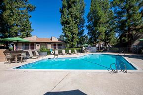Redlands apartment for rent - Swimming pool with lounge chairs at Redlands Park Apartments, Redlands, California