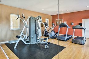 San Ramon apartment for rent - Fitness center/ on-site gym with a treadmill and weights  at Falcon Bridge at Gale Ranch, San Ramon