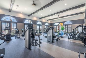 The gym at the bradley braddock road station apartments