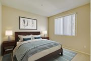 Los Angeles apartment for rent - a bedroom with a large bed and two night stands with lamps  at Tesoro Senior Apartments, Porter Ranch, California