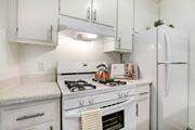 Reseda apartment for rent - a kitchen with a stove top oven at Sherway Villa, Reseda