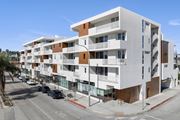 Culver City apartment for rent - A modern apartment building with white and brown exterior.