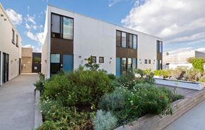 Venice apartment for rent - a white house with a garden in front of it