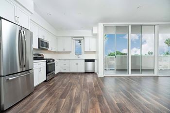 Modern kitchen with wooden floor
