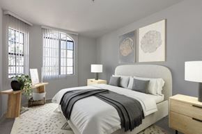 Los Angeles apartment for rent - a bedroom with grey walls and a white bed at Burton, Los Angeles, CA