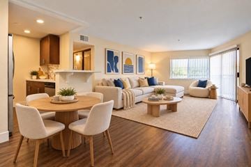 Los Angeles apartment for rent - A modern living room with a dining table and chairs.