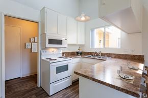 Dana Point apartment for rent - a kitchen with white appliances and a counter top at The Villas at Monarch Beach, Dana Point, 92629