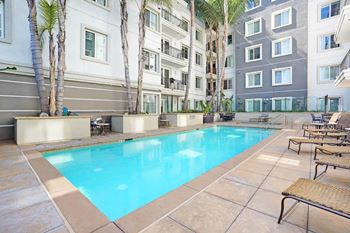 Swimming pool with lounge chairs