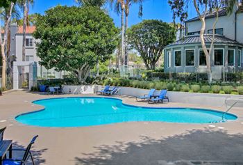Swimming pool with lounge chairs