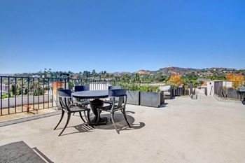 Outdoor grill with intimate seating area