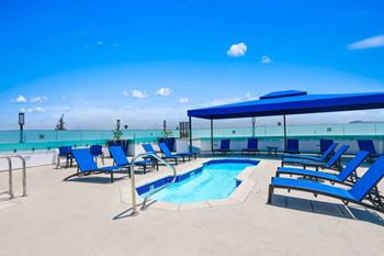 Swimming pool with relaxing sundecks