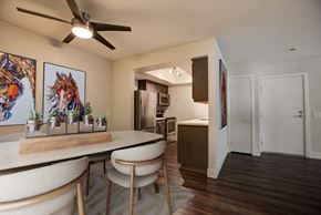 Laguna Niguel apartment for rent - a kitchen and dining room with a table and chairs at The Vista at Laguna, California, 92677