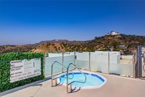 Los Angeles apartment for rent - pool a view of the griffith observatory from the top of a hill at The Kenmore Los Feliz, Los Angeles, CA