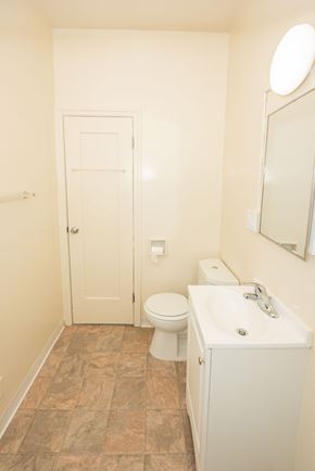 Santa Monica apartment for rent - A white toilet and sink in a small bathroom.