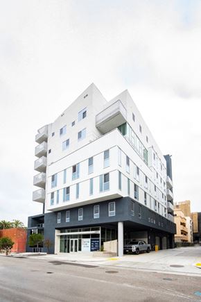 Santa Monica apartment for rent - 711 Colorado modern, sleek, multi-story apartment building with a white and black exterior.
