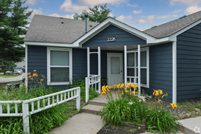Stillwater apartment for rent - A blue house with the number 2226 on the front door.