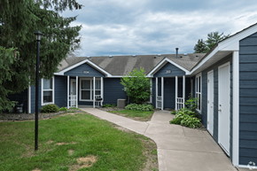 Stillwater apartment for rent - A blue house with a white door and windows.