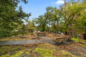 Granite Falls apartment for rent - A park with a picnic table surrounded by trees.