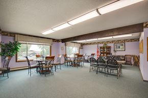 Marshall apartment for rent - a dining room with tables and chairs and a large window