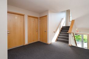 Owatonna apartment for rent - the entrance to a building with a staircase and two doors