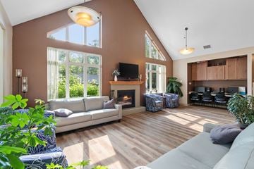 Stillwater townhouse for rent - a living room with a couch and a fireplace