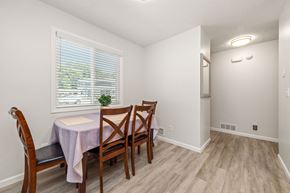 Burnsville townhouse for rent - A dining room with a table and chairs.