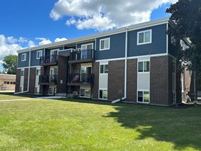 Owatonna apartment for rent - our apartments are located in a quiet area with green grass