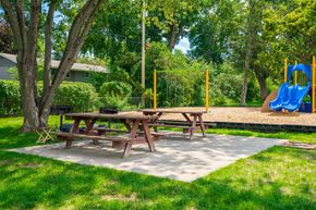 White Bear Lake apartment for rent - a picnic table and a playground in a park