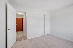 St Cloud apartment for rent - an empty bedroom with white walls and a door to a hallway