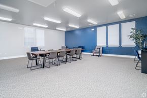 San Antonio apartment for rent - A conference room with a long table and chairs.
