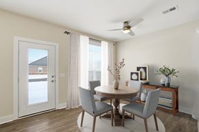 Findlay apartment for rent - A dining room with a table and chairs.