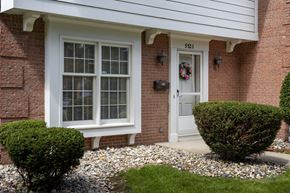 Toledo townhouse for rent - A house with a white door and window is numbered 5521.