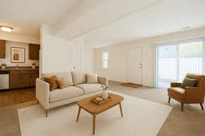 Toledo apartment for rent - A living room with a couch, a coffee table, and a chair.