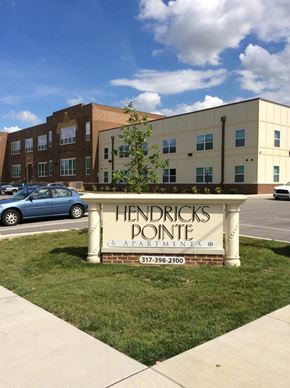 Shelbyville apartment for rent - a sign in front of a building  at Hendricks Pointe Apts, Shelbyville, 46176