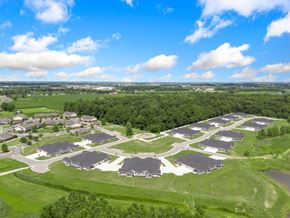 Fort Wayne apartment for rent - an aerial view of a neighborhood with houses and green grass at Morada at Maysville, Indiana